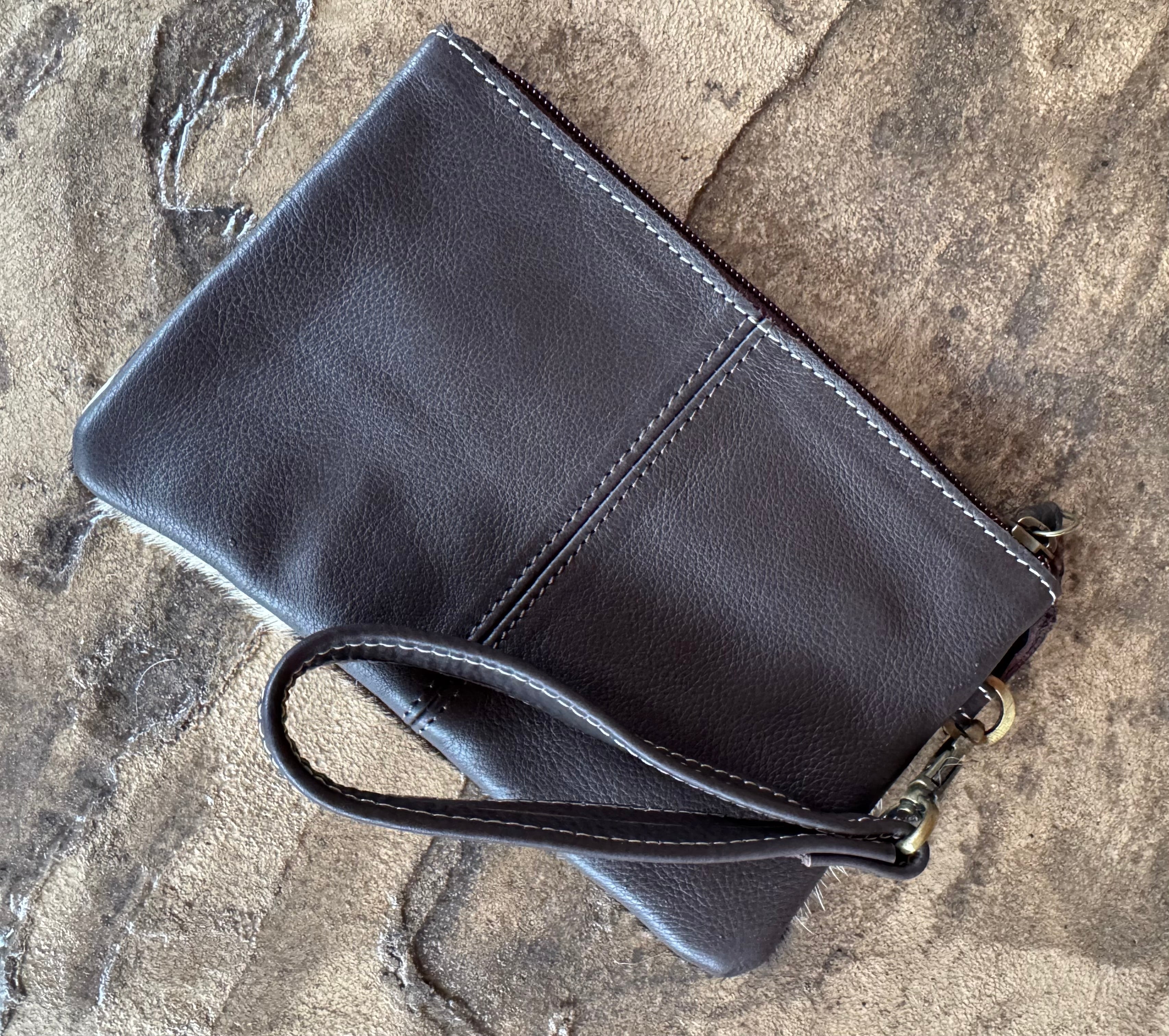 Flower Tooled And Brown Cowhide Wristlet